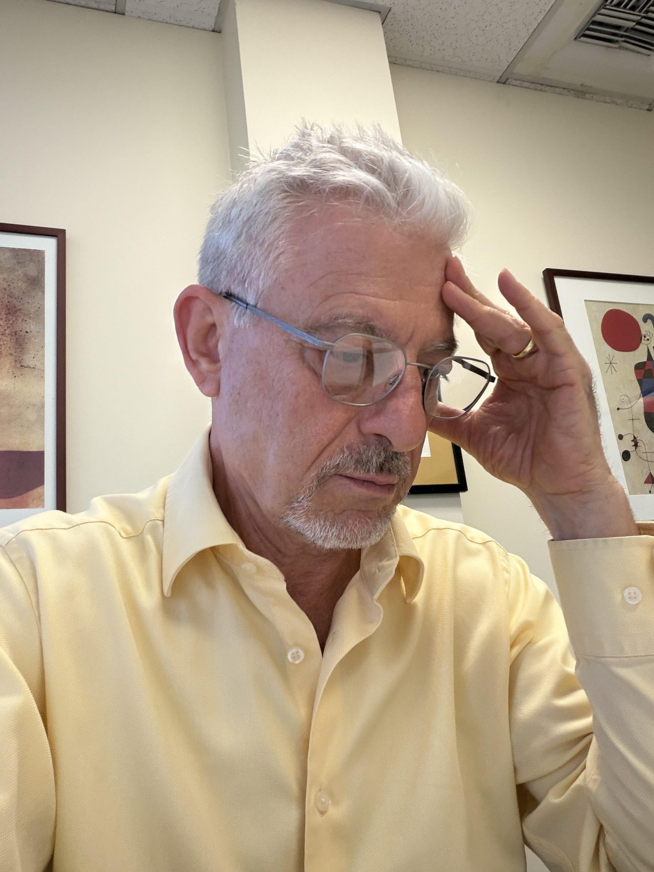 Vatche D. Tashjian reviewing a matter in his office